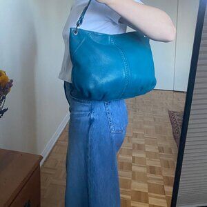 Danier Teal Shoulder Purse with Braid Detail. 15” by 12” by 1”